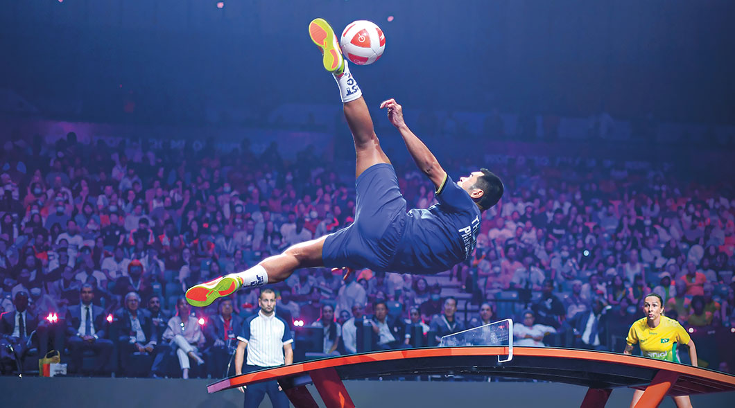 Image of a player jumping in the air to perform a roundhouse kick